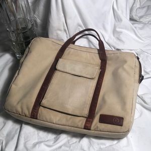 Penguin Canvas laptop bag with leather trim